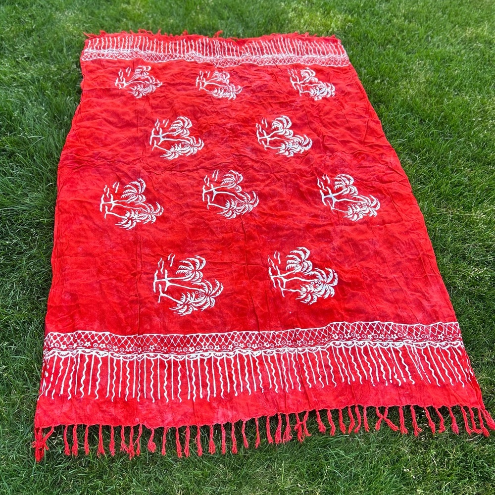 Beautiful red and white batik sarong with fringe
